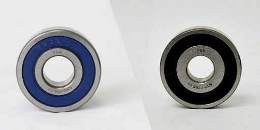 Comparison between PGN 6203-2RS and 6203-2RS-8 bearings showing blue and black sealed versions