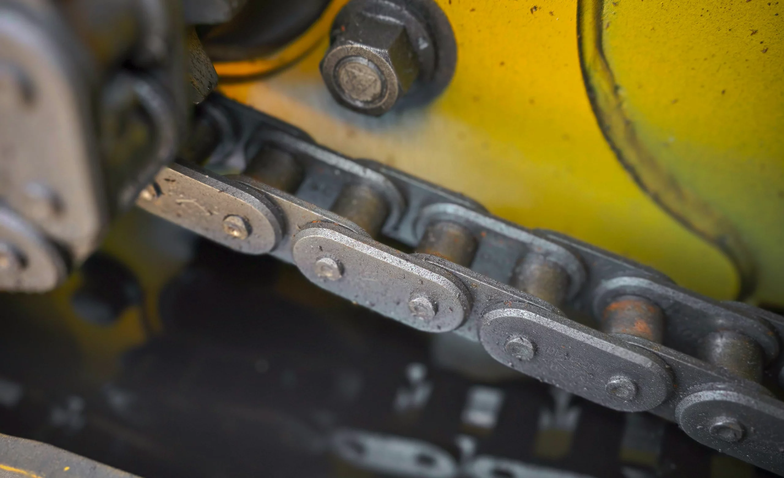 Industrial roller chains for power transmission and conveyor systems